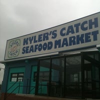Photo taken at Kyler&#39;s Catch Seafood Market by Marc D. on 6/26/2011