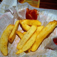 Photo taken at Red Robin Gourmet Burgers and Brews by Brian B. on 1/29/2011