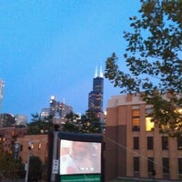 Photo taken at Fulton River District- Movies In The Park by Alex F. on 7/18/2012