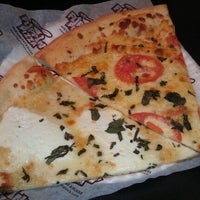 Photo taken at Flippin Pizza by Dana F. on 8/19/2011