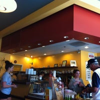 Photo taken at Infuzion Cafe by Jeannie N. on 5/4/2012
