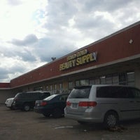 Photo taken at Solid Gold Beauty Supply by Jennifer P. on 10/23/2011