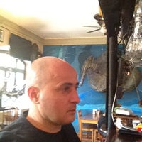 Photo taken at Divers Cafe by Ercan E. on 5/30/2012