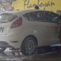Photo taken at Flamboyan Car Wash by Dian S. on 5/27/2012