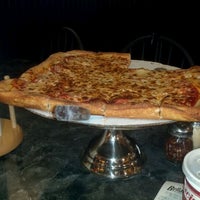 Photo taken at Bellacino&amp;#39;s Pizza &amp;amp; Grinders by Ted Y. on 5/19/2012