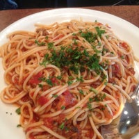 Photo taken at Amici&amp;#39;s East Coast Pizzeria by Angela W. on 4/2/2012