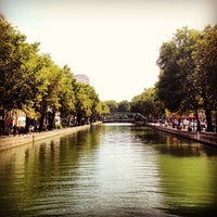 Photo taken at Canal Saint-Martin by Sandro S. on 8/21/2012