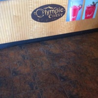 Photo taken at Olympic Crest Coffee Roasters by Michael F. on 8/17/2012