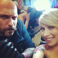 Photo taken at Rose Tattoo Parlor by Jenny W. on 1/15/2013