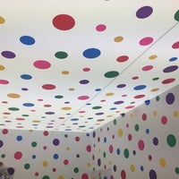 Photo taken at YAYOI KUSAMA: Life is the Heart of a Rainbow by YOT on 8/21/2017