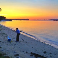 Photo taken at Pasir Ris Beach (Area 4) by Lorie on 5/1/2013