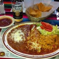 Photo taken at Los Pericos Taqueria by Phoebe on 11/20/2012