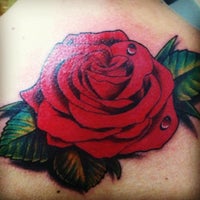 Photo taken at Red Tattoo by Marcio D. on 8/25/2013