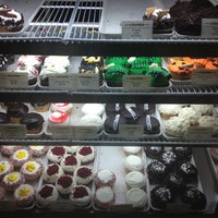 Photo taken at Crumbs Bake Shop by Jennifer J. on 10/6/2012