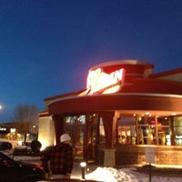 Photo taken at Red Robin Gourmet Burgers and Brews by Andrew B. on 1/6/2013