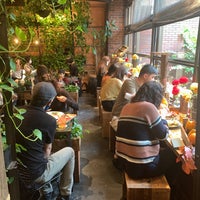 Photo taken at Aoyama Flower Market Tea House by Ethan W. on 10/11/2020