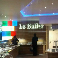 Photo taken at Le Buffet by Alex Z. on 12/22/2012
