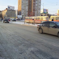 Photo taken at Остановка «Улица Большакова» by Alexey G. on 3/21/2013