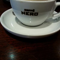 Photo taken at Caffè Nero by Juliet P. on 10/5/2014