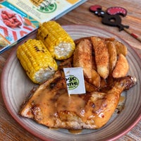 Photo taken at Nando&amp;#39;s by Jonathan L. on 12/22/2019