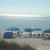 Photo taken at Pelican Bay Sandpiper Beach Club by Mollie R. on 4/13/2014