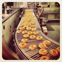 Photo taken at Krispy Kreme Doughnuts by Lee Y. on 12/16/2012