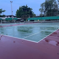 Photo taken at Sahakorn Village Soi 47 - Tennis Court by Bom N. on 4/25/2023