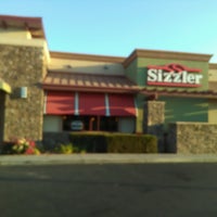 Photo taken at Sizzler by RAD M. on 7/29/2016