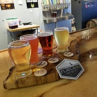 Photo taken at Flatland Brewery by Ryan H. on 7/20/2018