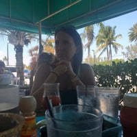 Photo taken at Juno Beach Café by Angie S. on 3/20/2022