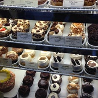 Photo taken at Crumbs Bake Shop by Kim D. on 3/8/2014