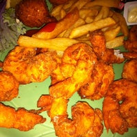 Photo taken at Awful Arthur&amp;#39;s Seafood Company by Dianne P. on 8/24/2011
