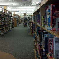 Photo taken at Webster Public Library by Eric P. on 12/18/2012
