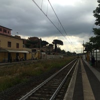 Photo taken at Stazione Magliana by Dmitry S. on 6/24/2015