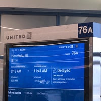 Photo taken at Gate 76 by Greg D. on 4/15/2019