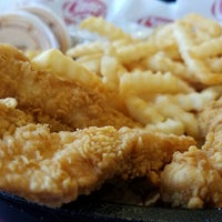 Photo taken at Raising Cane&#39;s Chicken Fingers by Richard W. on 4/3/2016