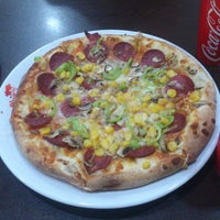 Photo taken at Pizza Pizza by Yunus Can on 3/24/2013