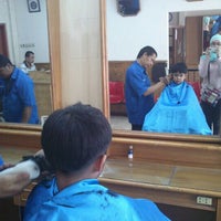 Photo taken at Puas Barber Shop by Shinta D. on 10/13/2012