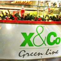 Photo taken at X&amp;amp;Co green line by sasha h. on 1/13/2013