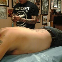 Photo taken at Bound For Glory Tattoo by Athena on 11/4/2012