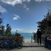 Photo taken at Elbow Beach by Emily W. on 2/16/2020