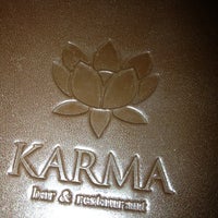 Photo taken at Karma by Andrew T. on 5/18/2013