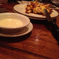 Photo taken at Outback Steakhouse by Camila M. on 4/14/2013