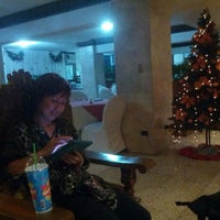 Photo taken at Marlim Mansions Hotel by Andrew G. on 12/5/2012