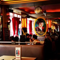Photo taken at Café des Deux Moulins by Sasha on 4/19/2013
