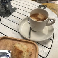 Photo taken at About Café by Elena R. on 3/29/2018
