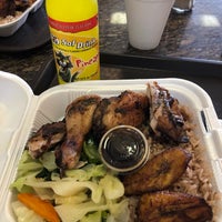 Photo taken at The Jerk Spot Jamaican Restaurant by graceface k. on 7/25/2019
