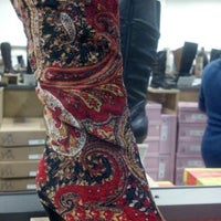 Photo taken at DSW Designer Shoe Warehouse by Holly D. on 10/23/2012