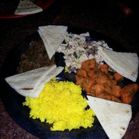 Photo taken at Poccadio Moroccan Grill &amp;amp; Sandwiches by Alyson W. on 9/15/2012