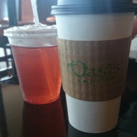 Photo taken at Oasis Coffee Spot by Laura R. on 4/19/2014
